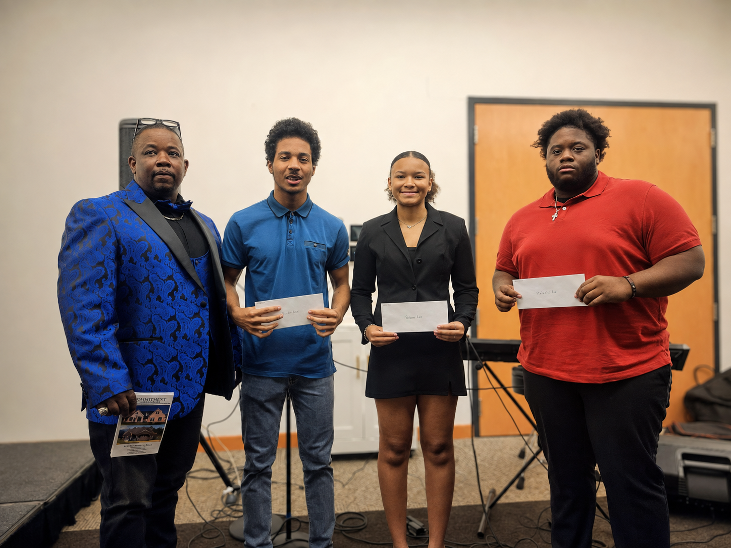 Scholarship presentation to three students during the banquet program